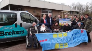 Reischeque gewonnen door een hele groep