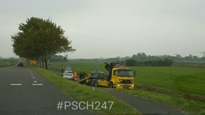 Auto van de weg, bestuurder met schrik vrij