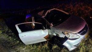 Auto over de kop Zanddijk Den Helder