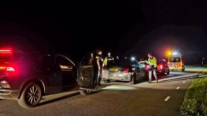 Auto te water, bestuurder aangehouden