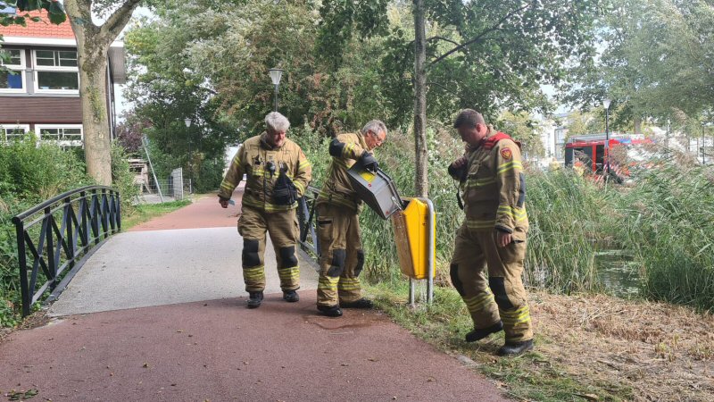 Brandje in prullenbak bij Regius