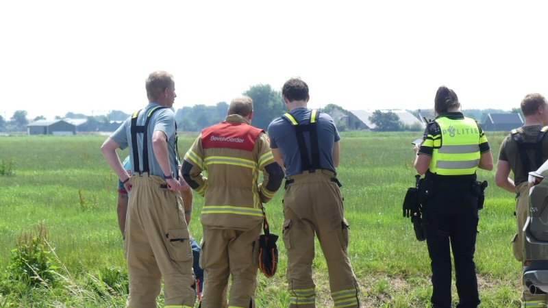Fietsster met driewieler te water in Schagen