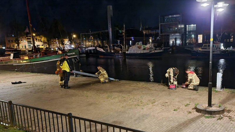 Man te water in Den Helder