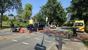 Bestuurder scootmobiel met schrik vrij