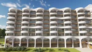 Wereldprimeur: 3D-betonprinter geeft 154 gedateerde flatwoningen een nieuw gezicht