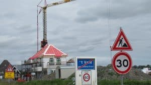 Vlag in top bij bouwplan De Vrijheid