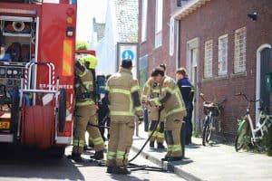 Brand boven winkelpand Den Helder