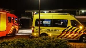 Woningbrand, bewoner springt van balkon